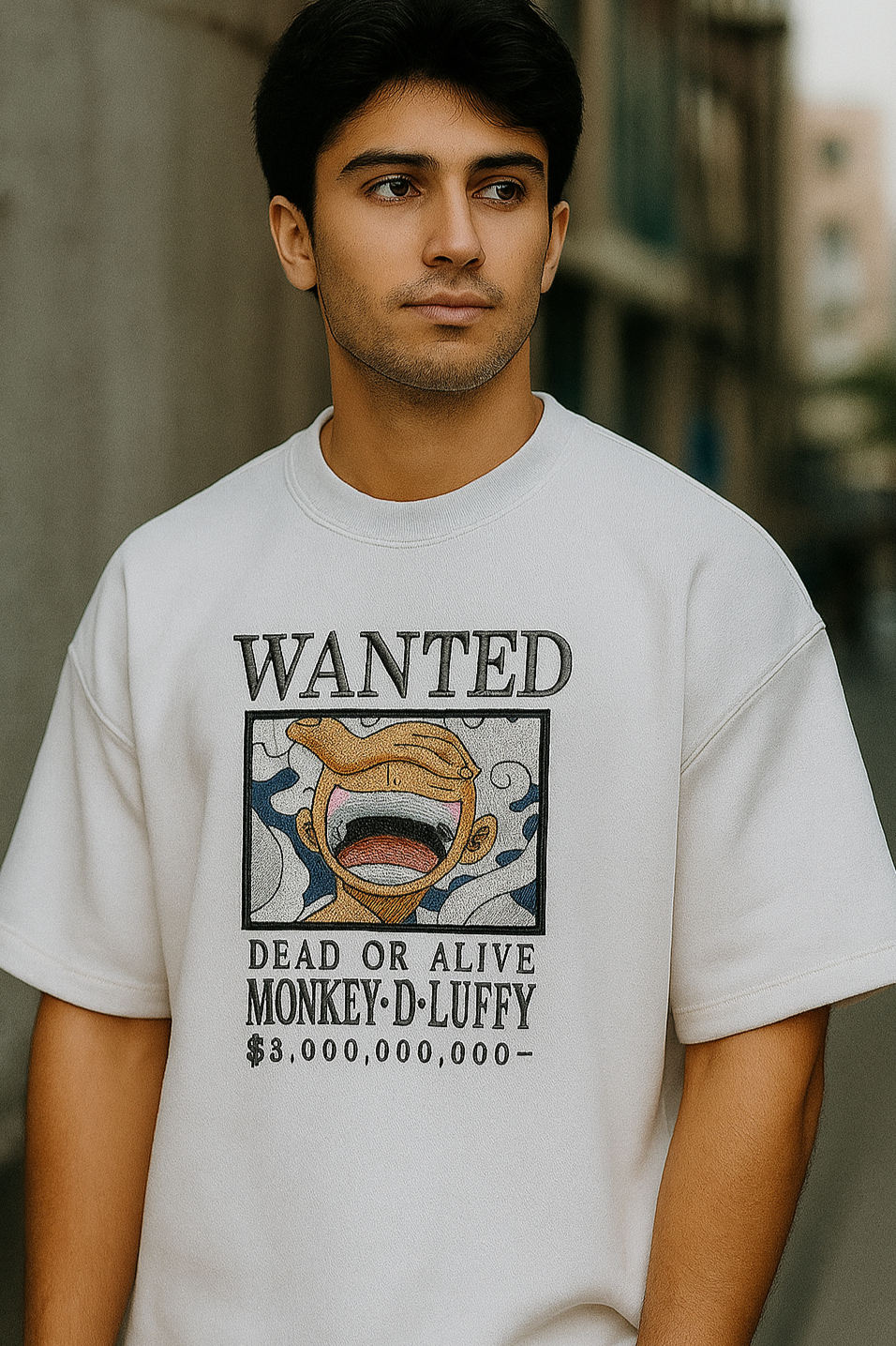 Gen Z model wearing a premium white oversized anime T-shirt featuring a bold One Piece Monkey D. Luffy embroidery design. Perfect streetwear for Gen Z’s who want to stand out. High-quality embroidered T-shirt made for anime lovers — shop now to buy trending embroidered T-shirts online.