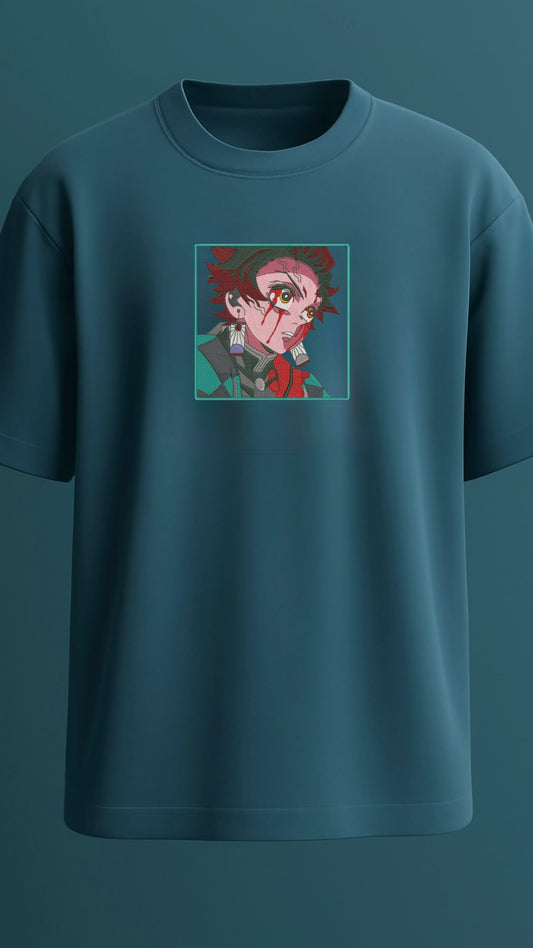 Premium quality oversized t-shirt featuring embroidery design of Tanjiro Kamado from Demon Slayer anime in crystal teal color