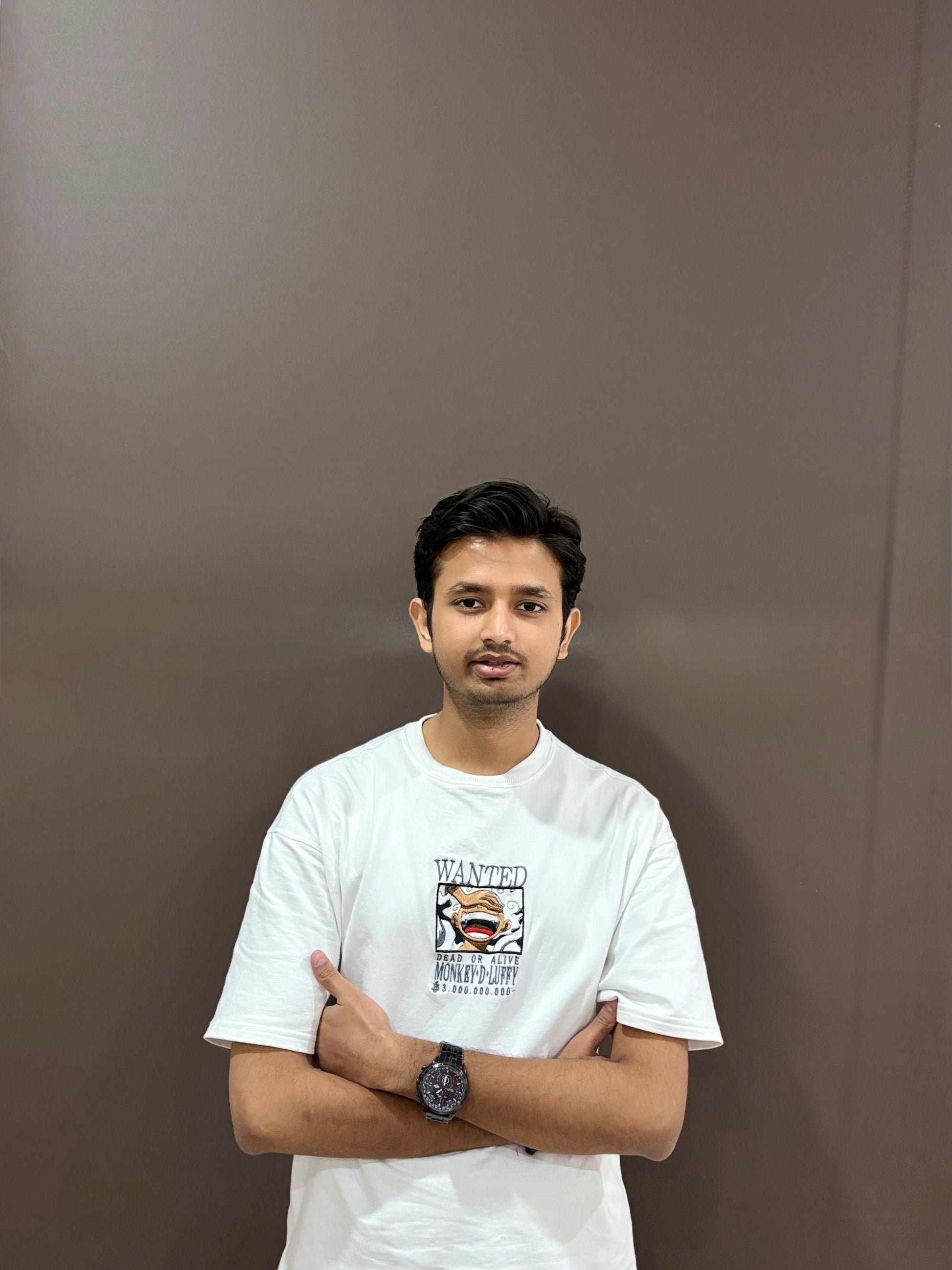 White oversized t-shirt with premium One Piece Luffy embroidery – Drip Saga anime streetwear.