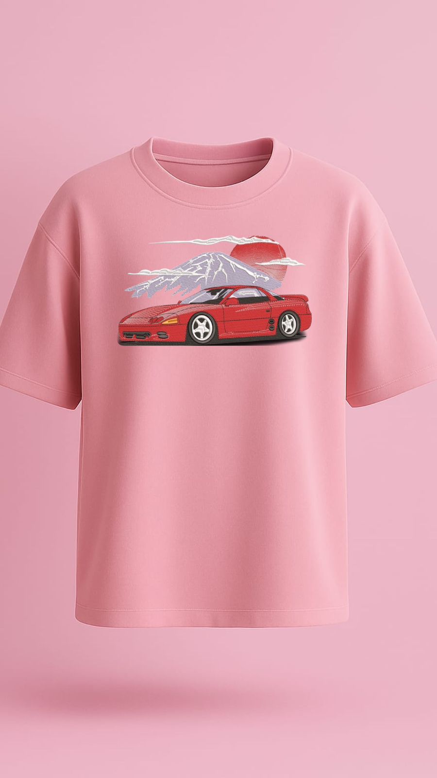 Baby pink oversized t-shirt with premium embroidered red JDM car and Mt. Fuji design, Japanese streetwear for Gen Z, aesthetic fashion, and high-quality anime car merch