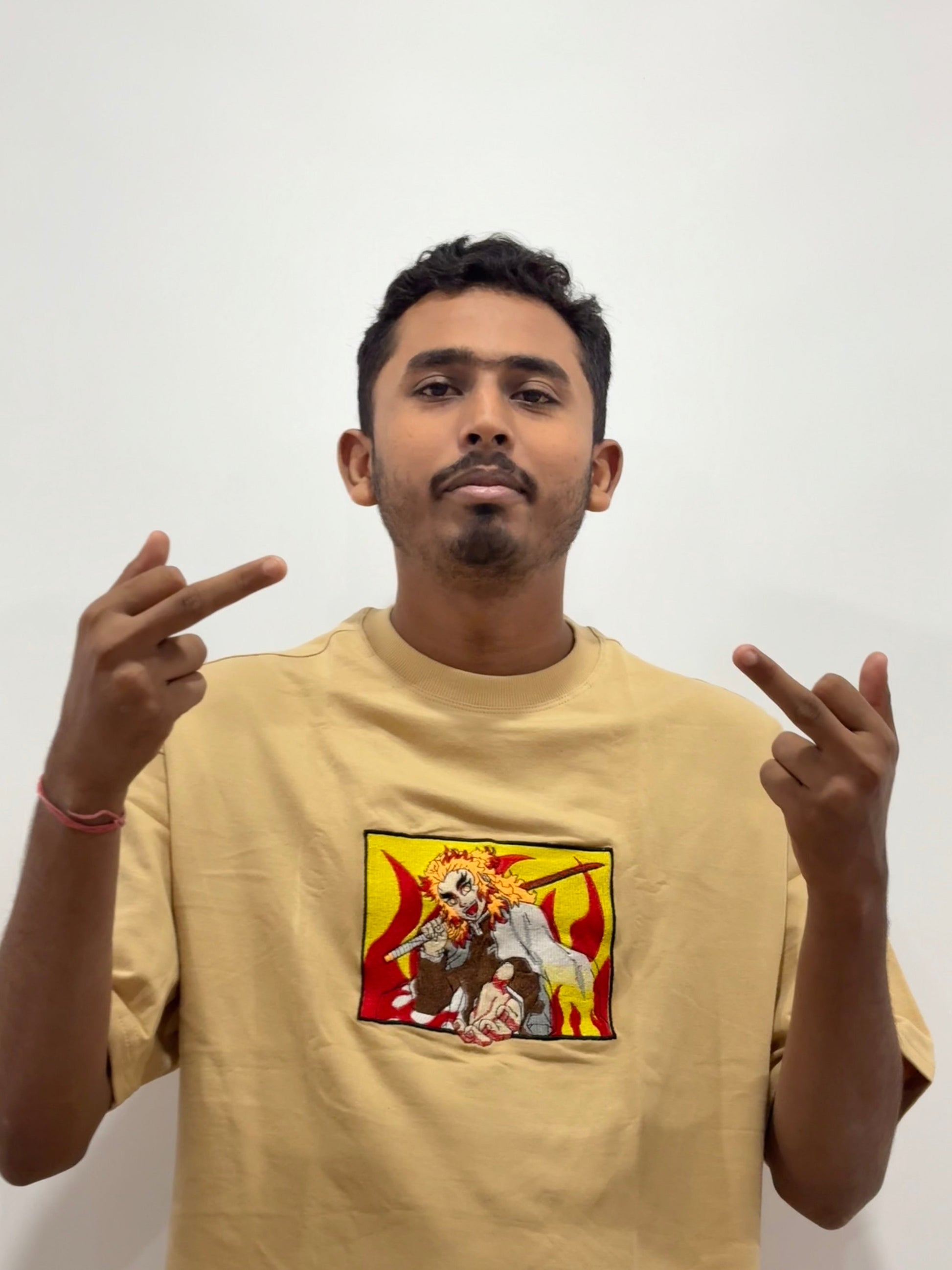 Beige oversized t-shirt with premium Demon Slayer Kyojuro Rengoku embroidery – Drip Saga anime fashion