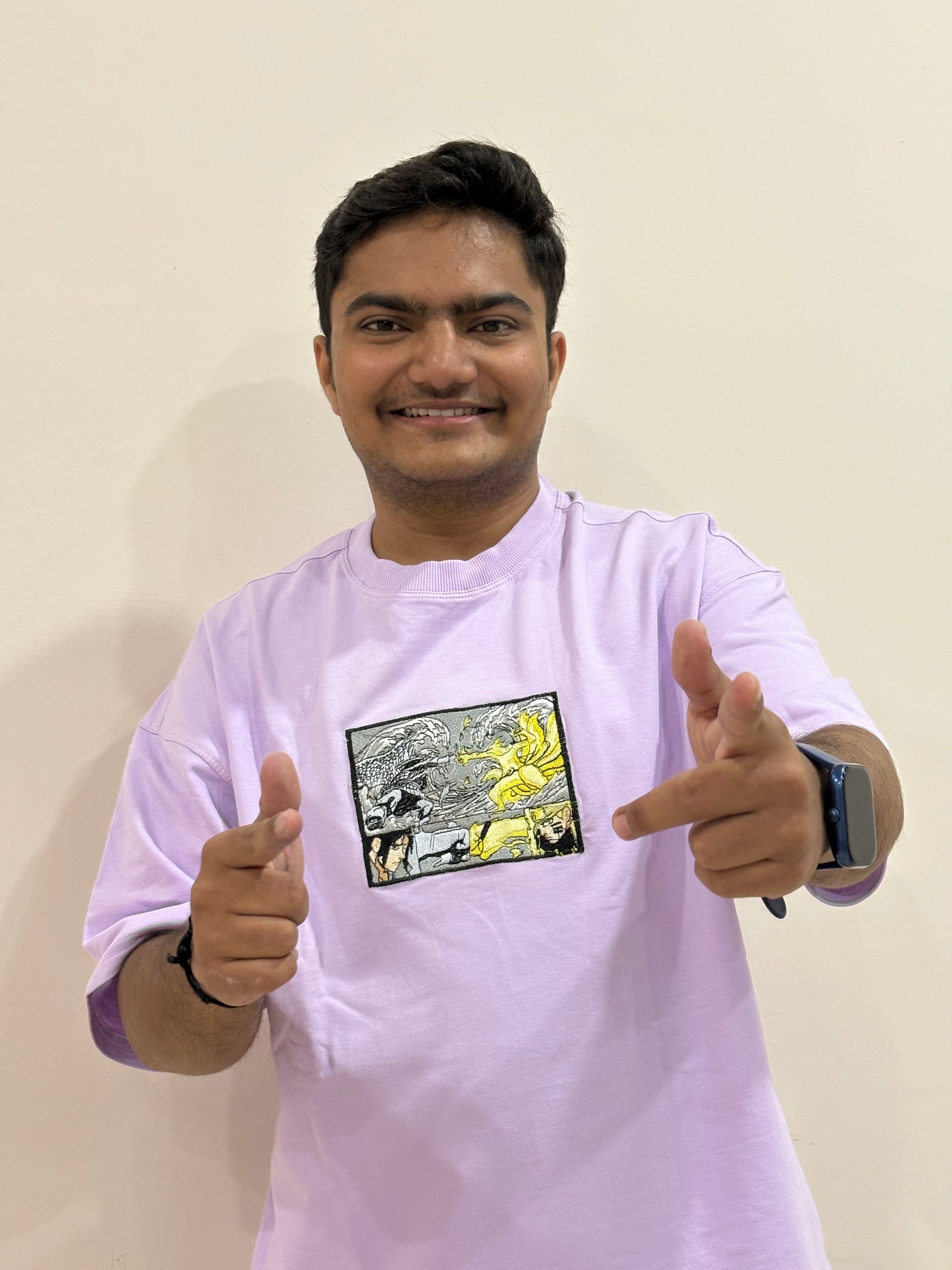Lavender oversized t-shirt with premium Naruto vs Sasuke embroidery – Drip Saga anime streetwear.